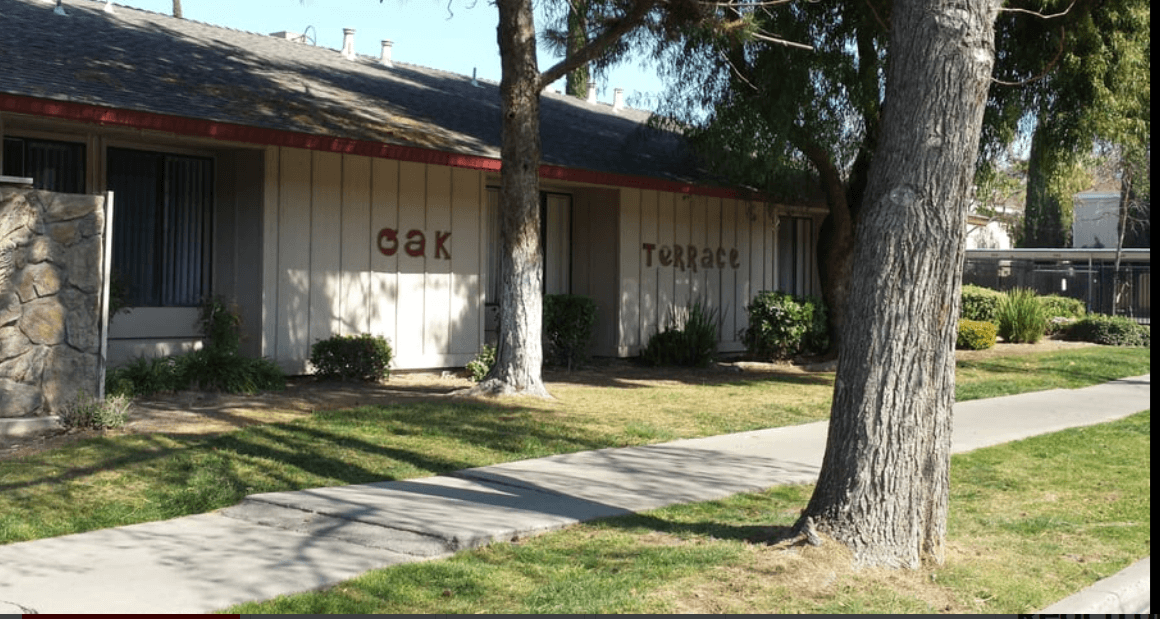 a building with the words Oak Terrace written on the side of it